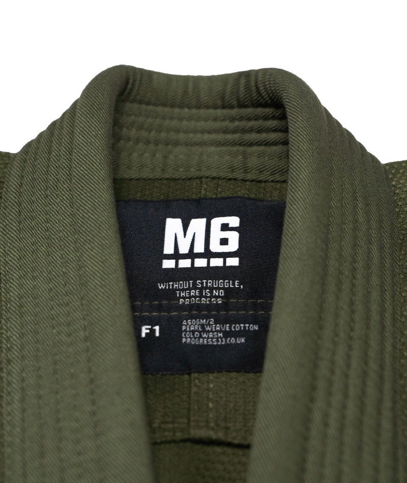 A close up image of the Limited Edition Forest Green Ladies M6 Kimono Mark 5 tag containing the size