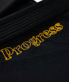 Progress brand embroidered on the black The Foundation Three Kimono