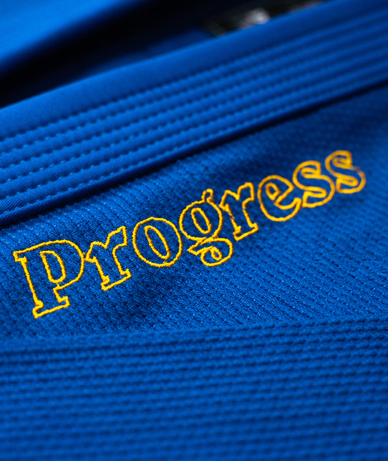 A close up view of the blue Ladies Foundation Three Kimono Progress embroidery