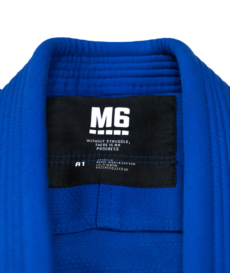 A close up of the Blue M6 Kimono Mark 5 tag