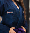 Navy Blue Ladies Unknown Koi Gi worn by a BJJ Purple Belt