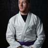 BJJ Purple Belt Athlete sporting The Academy Gi (White)