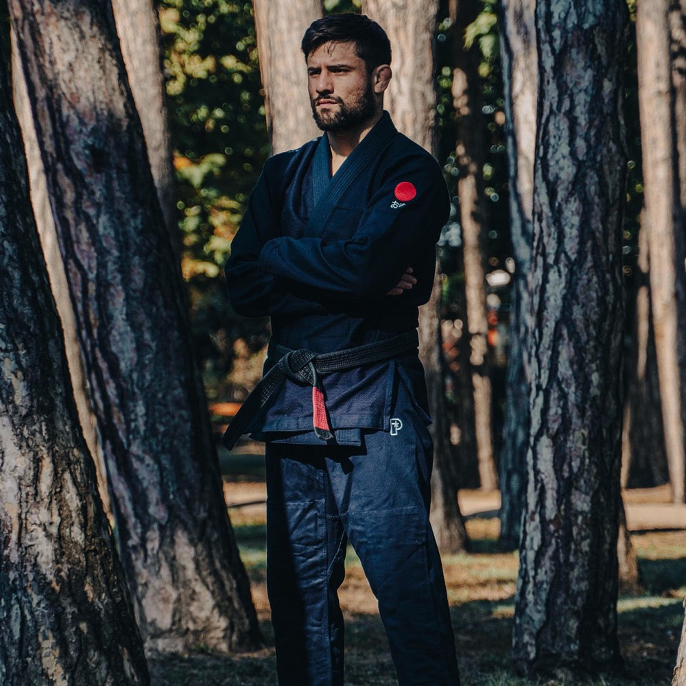 BJJ Black Belt Marc Berman wearing The Temple Kimono - Navy